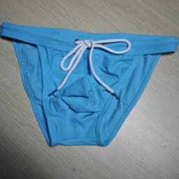 2026 New's slender waist men's swimming trunks foreign trade triangle swimsuit European and American new fashion D101