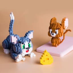 Funny Tom And Jerry Micro Building Blocks Cheese Cat and Mouse Assembly 3D Model Anime Mini Brick Figure Toy For Christmas Gift