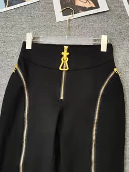 Summer women's retro irregular metal zipper design high waist feet pants fashion Joker elastic tight hip pants.
