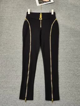 Summer women's retro irregular metal zipper design high waist feet pants fashion Joker elastic tight hip pants.