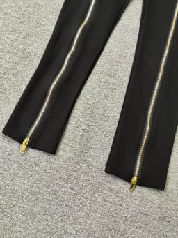 Summer women's retro irregular metal zipper design high waist feet pants fashion Joker elastic tight hip pants.