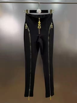 Summer women's retro irregular metal zipper design high waist feet pants fashion Joker elastic tight hip pants.