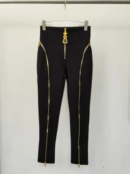 Summer women's retro irregular metal zipper design high waist feet pants fashion Joker elastic tight hip pants.