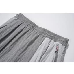 Women's Water-Repellent Summer Skirt-Pants – Mid-Waist, Asymmetrical Hem & Color-Block Design for Urban Outdoor & Casual Wear