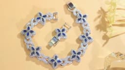 ThreeGraces Luxury Shiny Blue Zirconia Geometric Infinite Shape Bridal Wedding Lucky Leaf Link Chain Bracelet for Women Jewelry