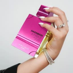 Al Haramain Amber Oud Ultra Violet: A luxurious fusion of violet and gold, amber and ebony, with intertwining notes of berry and violet, embodying the mysterious allure and elevated aloofness of Middle Eastern nobility.y