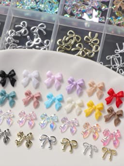 24 Grids of Nail Art Accessories, Resin Alloy Multi-Color Bow, Versatile Solid Color Streamer, Wearable Nail DIY Decoration