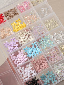 24 Grids of Nail Art Accessories, Resin Alloy Multi-Color Bow, Versatile Solid Color Streamer, Wearable Nail DIY Decoration