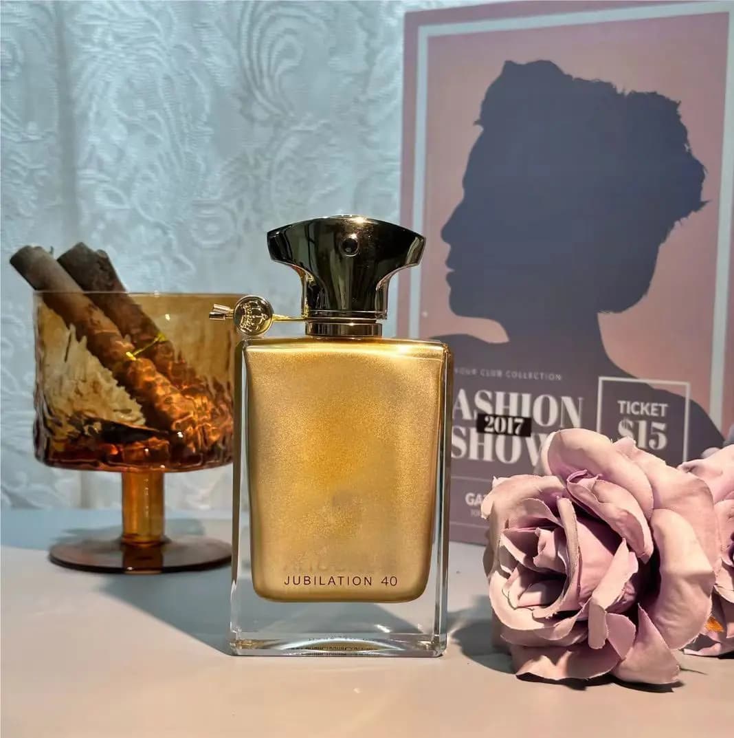 Jubilation 40, a luxurious golden fragrance with rich warm notes. Elegant bottle design, perfect for special occasions, gifts and personal collection.
