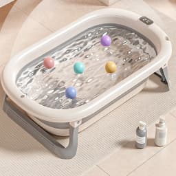 Foldable baby bath with bath mat, shower head connection & integrated thermometer - portable for babies from 0-36 months