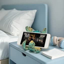 Hodao Resin Sea Turtle Figure Phone Holder, Cute Upside-Down Ocean Turtle Smartphone Stand with Glossy Teal Shell, Coastal Nautical Desk Decor for Home Office, Bedroom, Living Room, Shelf and Beach House, Marine Life Accent and Gift for Turtle Lovers