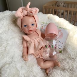10 Inch Meadow Full Body Silicone Reborn Doll With Pink Outfit Lifelike Newborn Hand‑Painted Waterproof Collectible Art Ornament for Holiday & Birthday Gifts