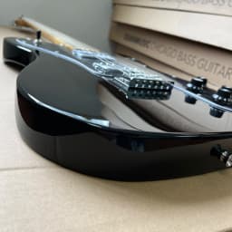 Solid wood electric guitar with bright black finish, maple fretboard, walnut body, dual pickups, Christmas gift, available in US warehouse, free shipping