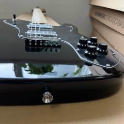 Solid wood electric guitar with bright black finish, maple fretboard, walnut body, dual pickups, Christmas gift, available in US warehouse, free shipping