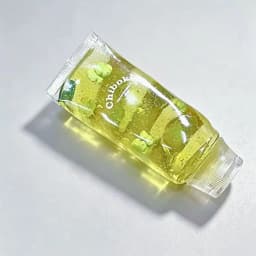 1pc Mini Fruit Drink Bottle Squishy Toy, Transparent Water Bottle Squeeze Fidget Toy, 3D Fruit Inside Pinch Toy, Novelty Stress Relief Hand Toy for Teens Adults