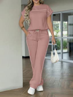 New Spring‑Autumn Women’s Color‑Contrast Stitching Two‑Piece Outfit. Crew‑neck short‑sleeve top with decorative pockets, drawstring high‑waist wide‑leg trousers with side practical pockets. Made of stretchy & soft fabr