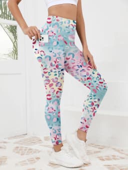 Printed women's high waistband pocket fitness pants paired with tight abdominal yoga pants, suitable for running, hiking, and sp