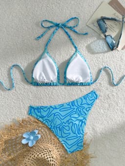 The blue striped bikini design is fashionable and individual and the halterneck tie can be adjusted freely and it is a must-ha
