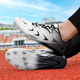 Men Women Professional Track Spike Soft Field Non Slip Racing Long Jump Running Sprint Shoes Athletic Nails Race Light weight