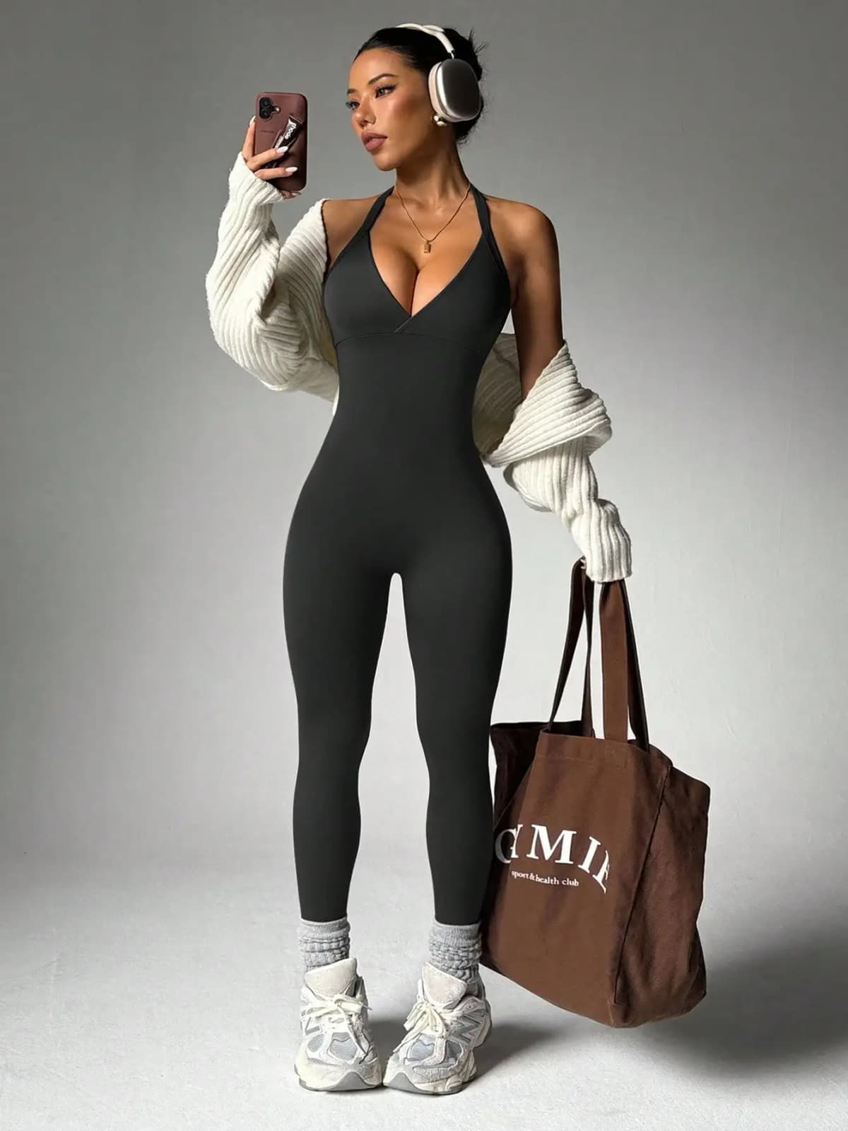 Women's solid color vest style seamless elastic sports jumpsuit with pocket design