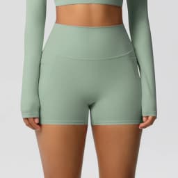 Women's Solid Color Nylon Yoga Tightening Tummy Lifting Shorts Outdoor Cycling Running With Pockets Sports Shorts Gym Pilates