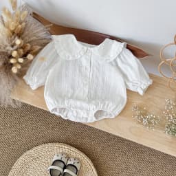 2025 Autumn New Spring and Autumn Baby Ha Yi New Clothing White Polka Dot Doll Collar Design Pure Cotton Cute and Cute Baby Jump