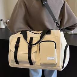 The Neutral Color Backpack for Men and Women Is Suitable for Travel and Can Be Carried by Hand or Worn on The Shoulder.