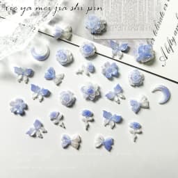 50pcs New Blue Series Nail Accessories Elegant Night Glow Flower Moon Butterfly Nail Charms Jewelry Mixed DIY Cute Nail Art Deco
