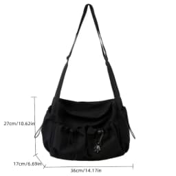Fashionable Crossbody Bag with Drawstring Accent - Spacious & Secure Zipper Closure - Includes Stylish Bag Charm