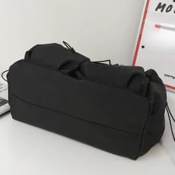 Fashionable Crossbody Bag with Drawstring Accent - Spacious & Secure Zipper Closure - Includes Stylish Bag Charm