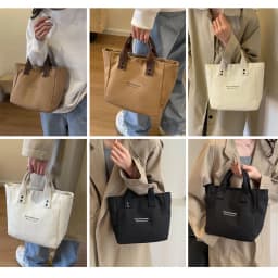 A Casual Canvas Tote Bag with a Bell Pendant and Zipper Closure; This Stylish and Durable Tote Bag Is Perfect for School and Work