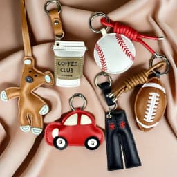 Chill Vibes Only: PU Leather Keychain Set for a Casual Lifestyle. Features Relaxing Charms like Coffee, Sports, Travel-Gifts