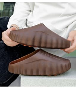 popular cross-border slippers men's and women's baotou hole shoes thick-soled eva stepping on shit massage recovery coolslippers