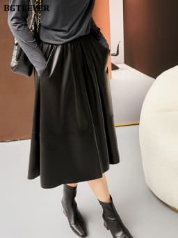 BGTEEVER Stylish Elastic Waist Women PU Leather Skirts Spring Autumn Loose Pockets Faux Leather A-line Skirts Female