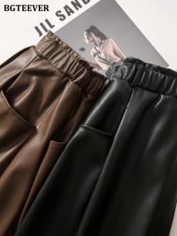 BGTEEVER Stylish Elastic Waist Women PU Leather Skirts Spring Autumn Loose Pockets Faux Leather A-line Skirts Female