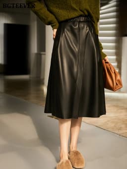 BGTEEVER Stylish Elastic Waist Women PU Leather Skirts Spring Autumn Loose Pockets Faux Leather A-line Skirts Female