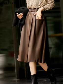 BGTEEVER Stylish Elastic Waist Women PU Leather Skirts Spring Autumn Loose Pockets Faux Leather A-line Skirts Female
