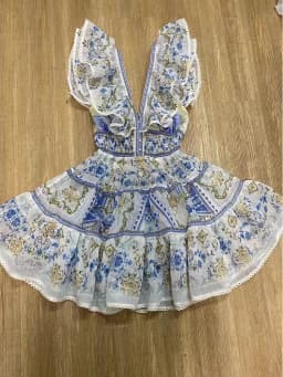 Retro high-end V-neck ruffled flying sleeve skirt summer women's new waist slim strap backless printed holiday style dress