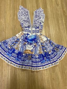 Retro high-end V-neck ruffled flying sleeve skirt summer women's new waist slim strap backless printed holiday style dress