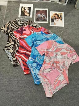 Retro Summer Women's New Short-Sleeved Slim Stretch Printed Jumpsuit Fashion Joker Tulle Perspective Gauze Temperament Top.