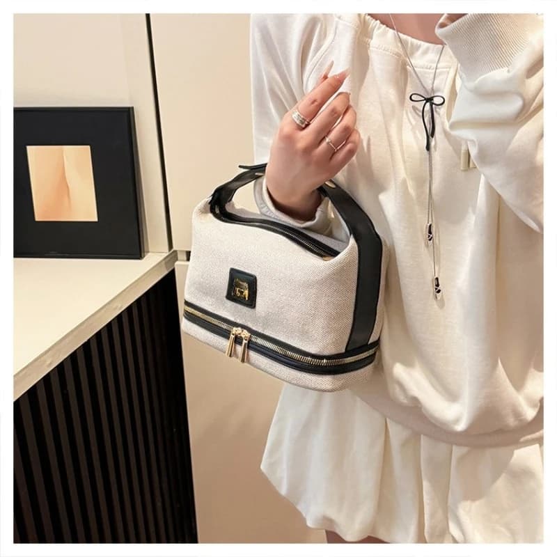 New in Metal Label Retro Luxury Canvas Handheld Makeup Bag with High Quality and Multi Functional Travel Storage Bag