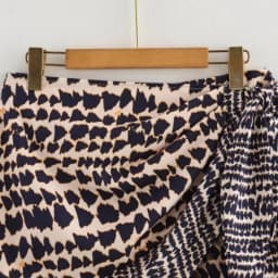 2026 Sexy Leopard Print Mini Skirt Women Asymmetrical Tie Waist Metal Fringe Hem Skirt for Party Street Wear