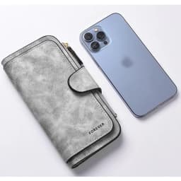 Featuring a cat motif this women's long wallet offers multiple card slots a coin pocket and a cell phone pouch A perfect gift