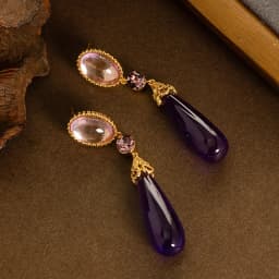 Retro style palace style long large water drop resin drop earrings light luxury high-end face slimming tassel commuter earrings