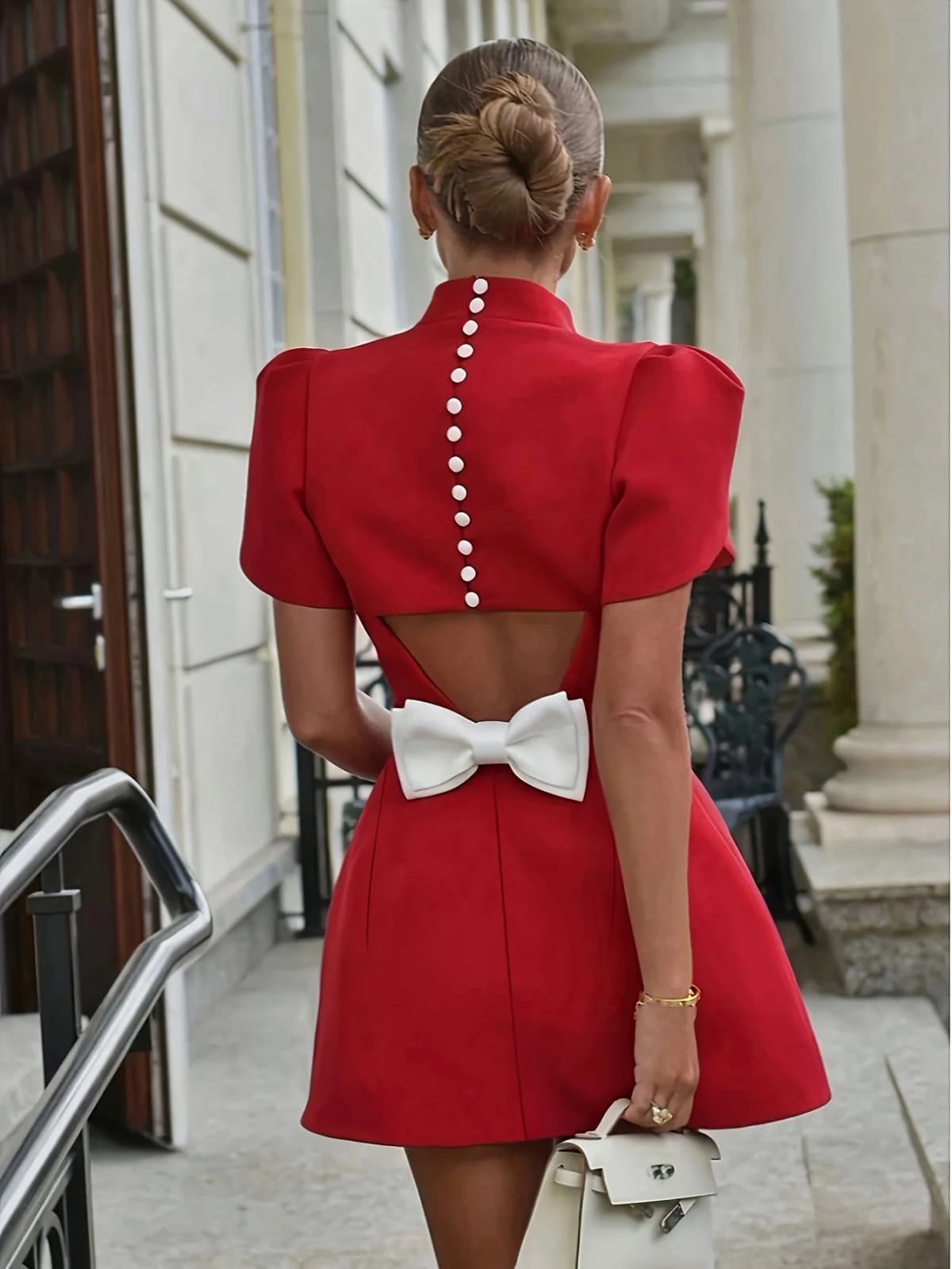 Leisure and elegant style with hollowed out bow design at the back, round neck button up women's dress, mid length skirt