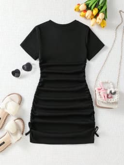 2026 Casual Spring and Summer Girls' Wrinkle Bow Solid Color Short Sleeved Round Neck Dress Long Skirt Suitable for Daily Travel
