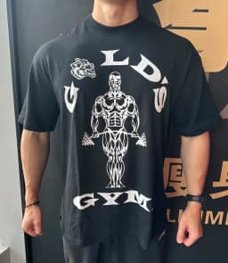 2026 GYM Wolf Head Jim Short-Sleeved Fitness Sports Loose Elastic Cotton Sweat-Wicking Breathable Sports Top European Size