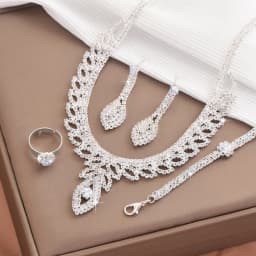 New product leaf necklace and earrings set of four pieces - fashionable European-style wedding diamond accessories