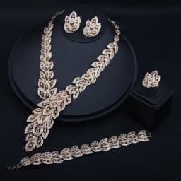 Alloy Feather Gemstone Necklace Earrings Ring Bracelet Set of Four. High-quality waterproof jewelry