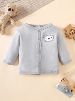 his 8-piece unisex newborn layette set fits boys and girls aged 0-9 months, with lovely grey bear prints.